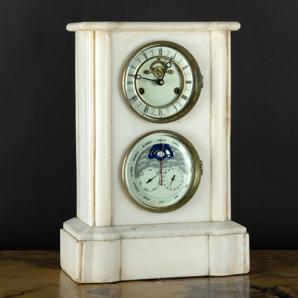 Appraisal: French White Marble Calendar and Moon Phase Clock The dial