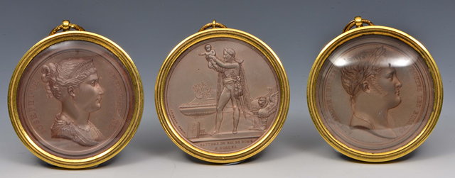 Appraisal: A SET OF THREE EMPIRE BRONZE SILHOUETTE CLASSICAL PORTRAITS in