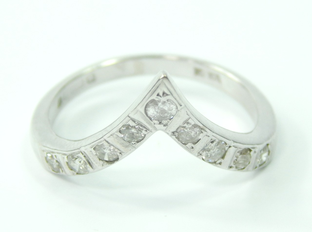 Appraisal: An ct white gold and diamond set wishbone ring set