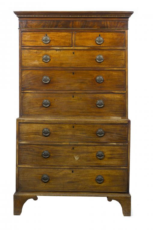 Appraisal: A GEORGE III MAHOGANY CHEST-ON-CHEST with dentil-inlaid cornice and figured