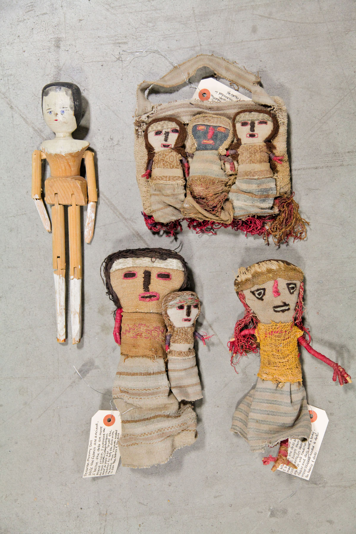 Appraisal: FOUR DOLLS American and Peruvian th century Three mummy dolls