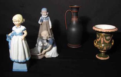 Appraisal: Three piece group of porcelain figures and two table articles