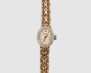 Appraisal: GIRARD PERREGAUX K Gold and Diamond Wristwatch GIRARD PERREGAUX K