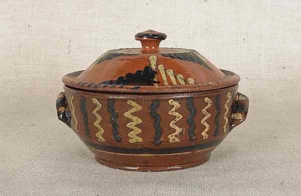 Appraisal: Bucks County Pennsylvania redware covered bowl th c with yellow