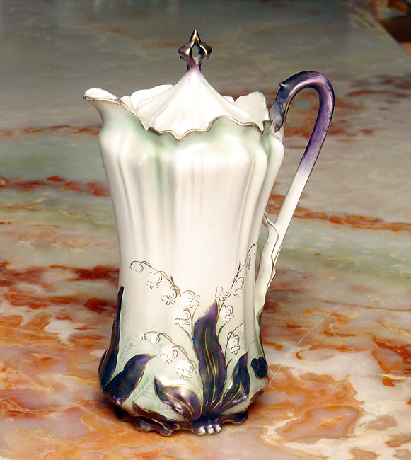 Appraisal: RS PRUSSIA PORCELAIN CHOCOLATE POT Fluted body with floral motif