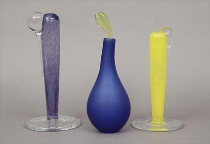 Appraisal: Two Kosta Boda Glass Candlesticks Signed Together with a modern