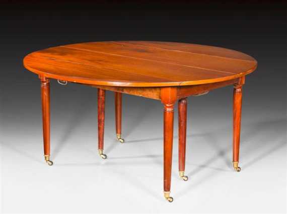 Appraisal: ROUND EXPANDABLE TABLE Louis XVI Paris circa Shaped mahogany On