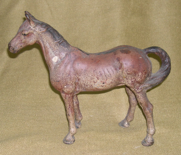 Appraisal: American Polychromed Cast-Iron Door Stop of an Alert Horse first