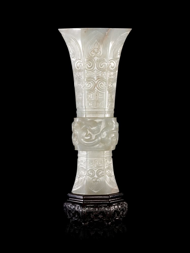 Appraisal: A Carved White Jade Gu Vase Height in cm A