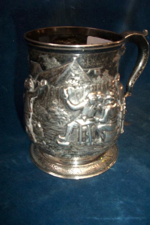 Appraisal: A silver one pint tankard of baluster form on a