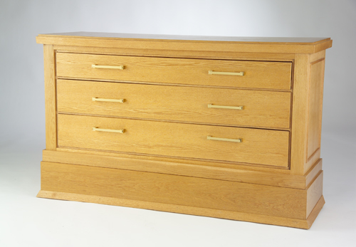 Appraisal: FRANK LLOYD WRIGHT Dresser of contemporary vintage with three long