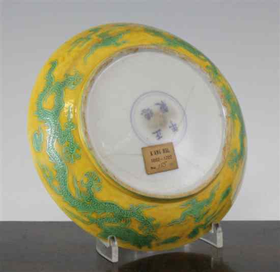 Appraisal: A Chinese Ming green and yellow glazed 'dragon' dish Zhengde