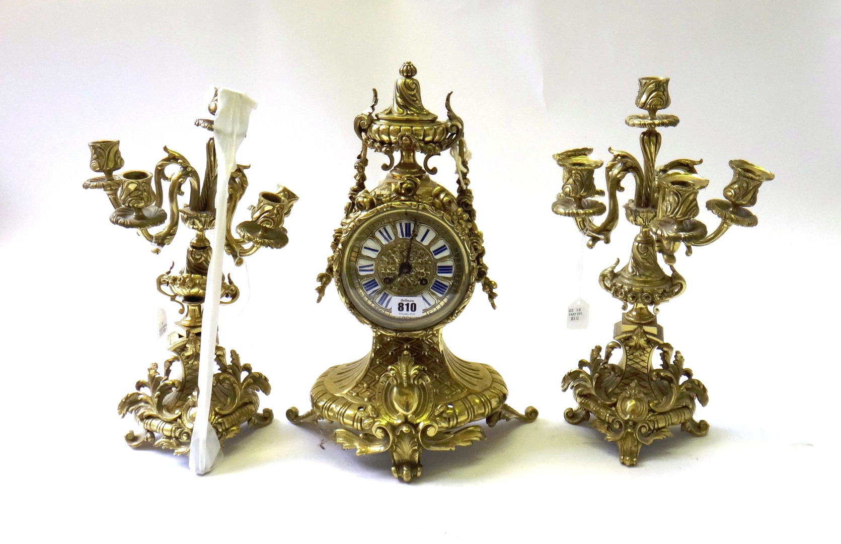 Appraisal: A French gilt brass mantel clock garniture of Louis XVI