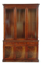 Appraisal: A VICTORIAN FLAME MAHOGANY BOOKCASE Having an ogee cornice above