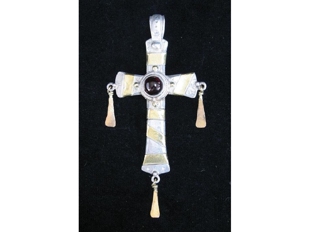 Appraisal: A SILVER PECTORAL CROSS with gold-coloured irregular strapwork to one