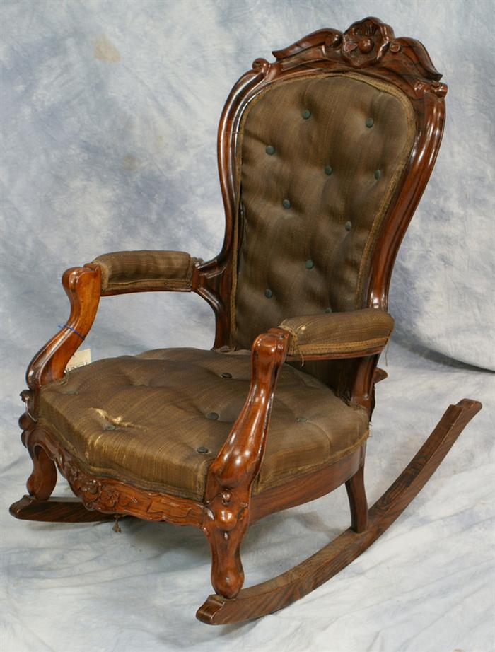 Appraisal: Rose carved rosewood rococo Revival rocking chair original upholstery with