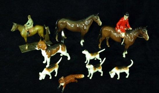 Appraisal: Two Beswick horses four hounds another hound a fox and