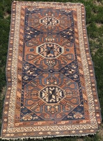 Appraisal: EARLY TH CENTURY CAUCASIAN RUG GEOMETRICDESIGN WITH BLUE FIELD LIGHT