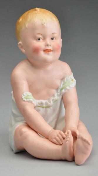 Appraisal: Heubach Piano Baby Description German bisque baby with Gebruder Heubach