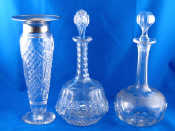 Appraisal: A cut glass decanter with star cut base and slice