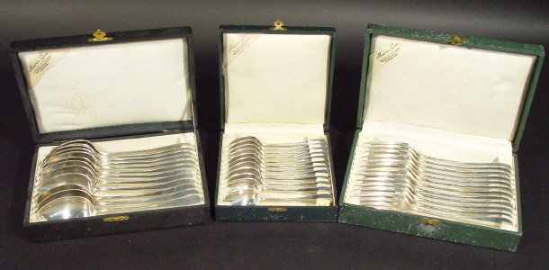 Appraisal: Three cased sets of French silver flatware comprising table spoons