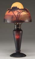 Appraisal: DAUM NANCY CAMEO LAMP Scenic shade with dark brown-purple trees