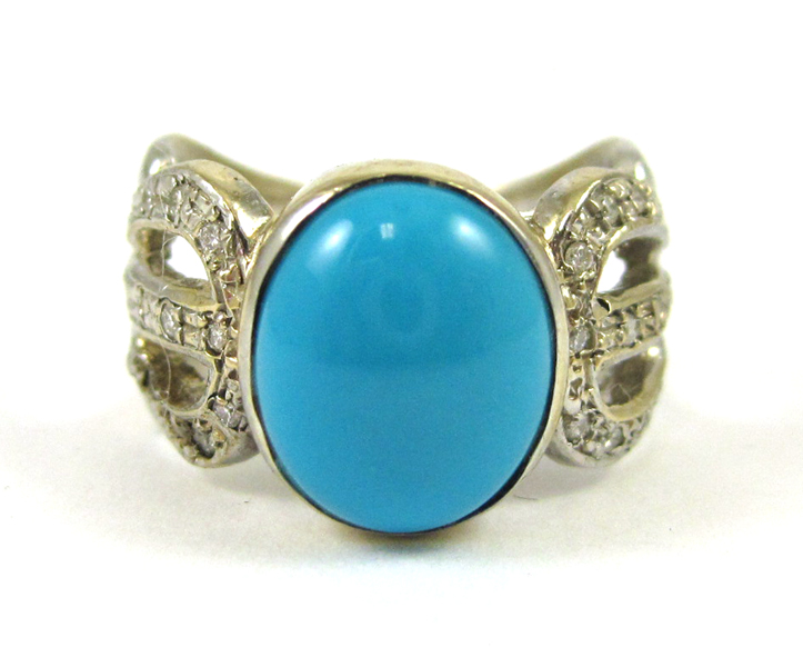 Appraisal: TURQUOISE AND FOURTEEN KARAT WHITE GOLD RING with round-cut diamonds