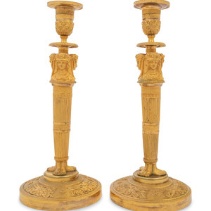 Appraisal: A Pair of Empire Gilt Bronze Candlesticks th Century Height