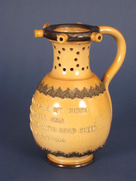 Appraisal: A Doulton Lambeth stoneware Puzzle Jug with verse From Mother