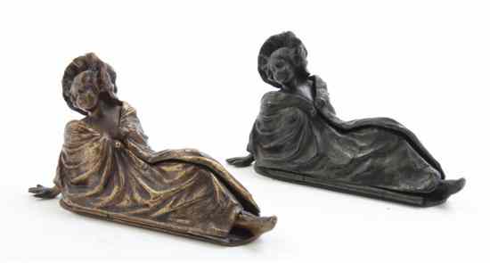 Appraisal: A Pair of Continental Bronze Figures each depicting a reclining