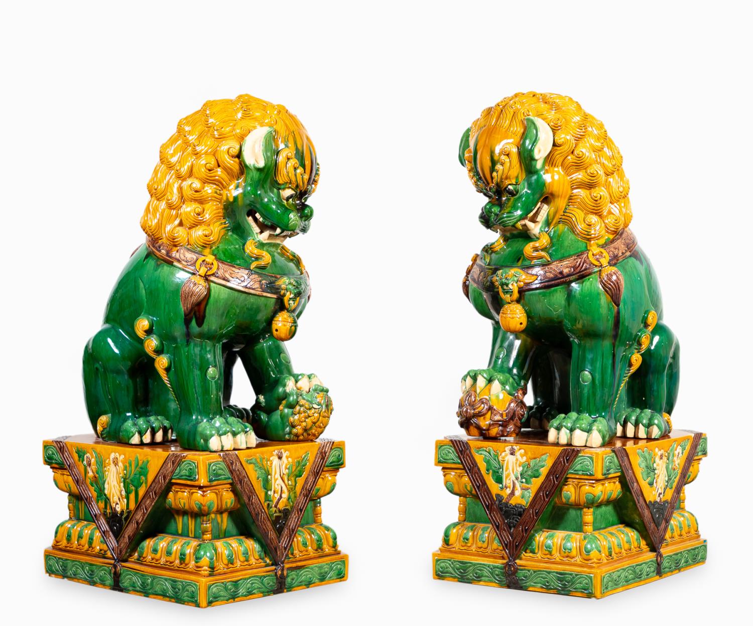 Appraisal: PR MONUMENTAL SANCAI GLAZED GUARDIAN LIONS Pair of monumental Chinese