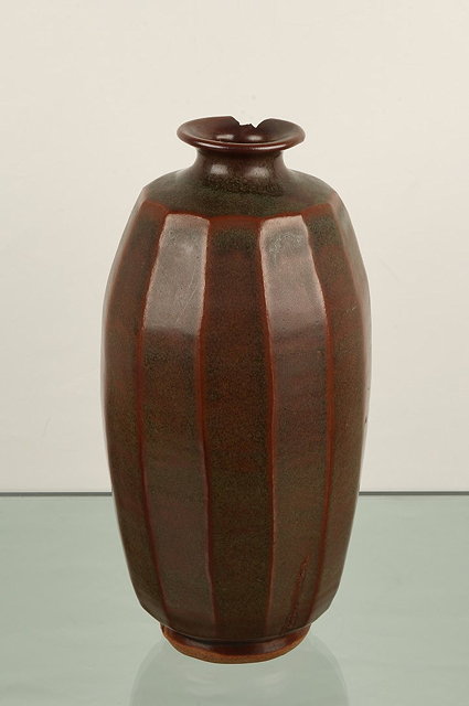 Appraisal: Geoffrey Whiting British - at Avoncroft PotteryVasefaceted and in tenmoku