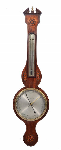 Appraisal: A GEORGIAN MAHOGANY WHEEL BAROMETER the silvered dial signed J