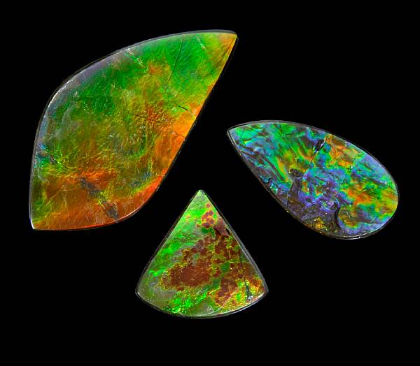 Appraisal: Alberta Canada A teardrop-shaped brilliant cabochon displays a goodly portion