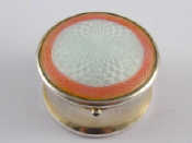 Appraisal: A silver round pillbox with engine turned enamelled lid by