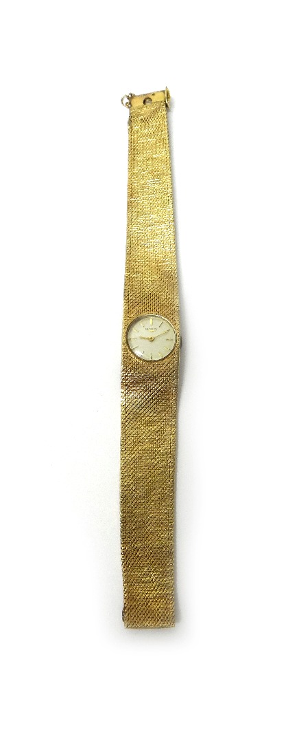 Appraisal: A lady's ct gold Longines bracelet wristwatch the signed circular