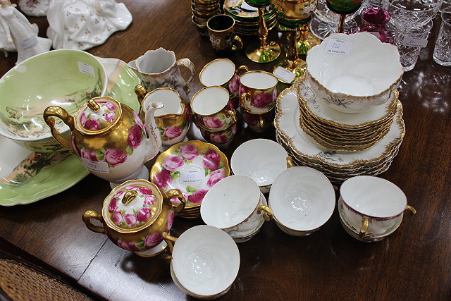 Appraisal: A ROYAL ALBERT GILT AND ROSE DECORATION SIX PERSON COFFEE