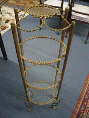 Appraisal: Italian Metalwork Curio Shelf Standa trio of oval glass lined