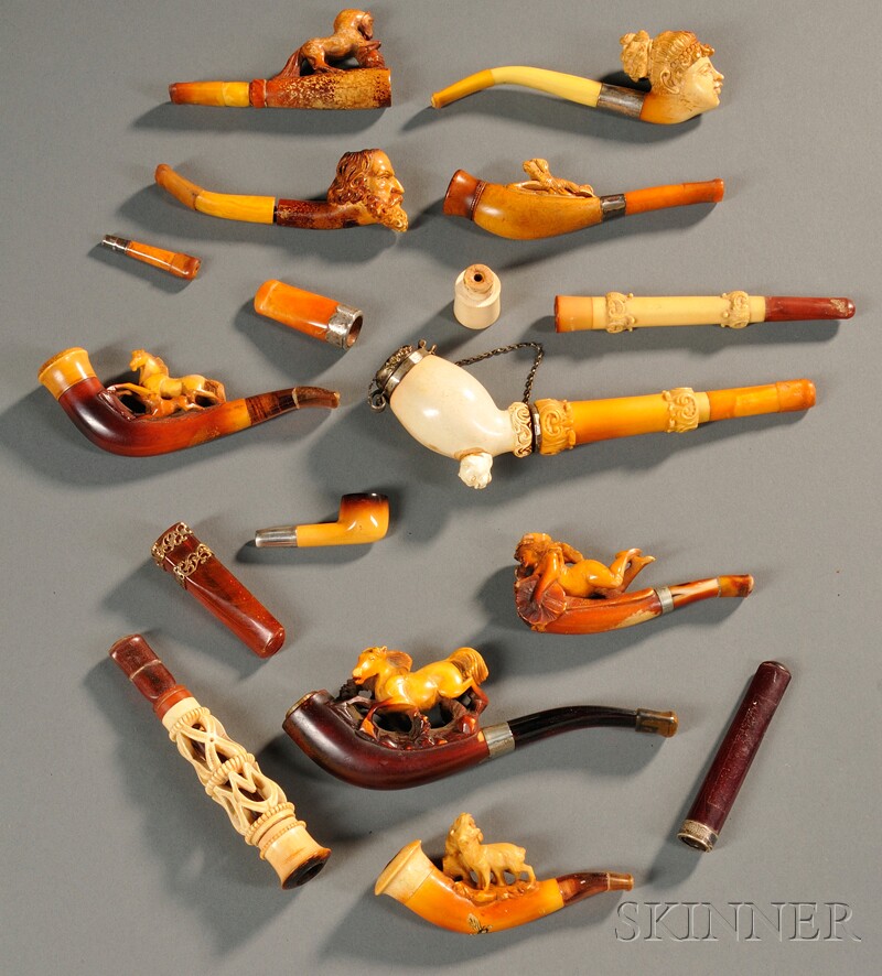 Appraisal: Fourteen Assorted Pipes and Cheroot Holders a fitted case containing