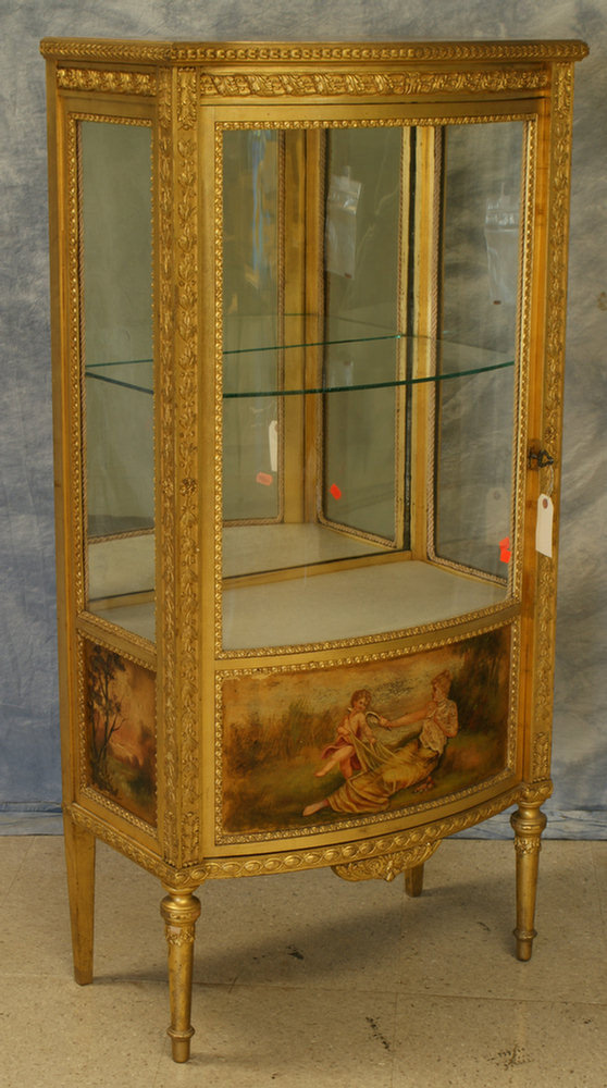 Appraisal: Louis XVI style carved and gilt curio cabinet single bowed