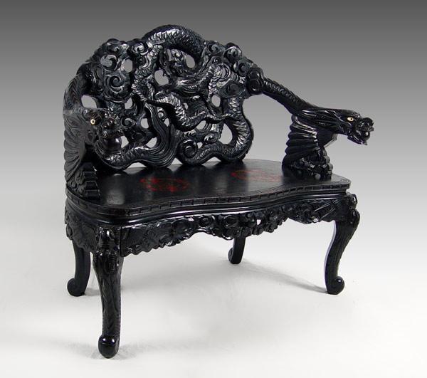 Appraisal: CHINESE CARVED AND LACQUERED SETTEE Heavily carved depicting flying dragon