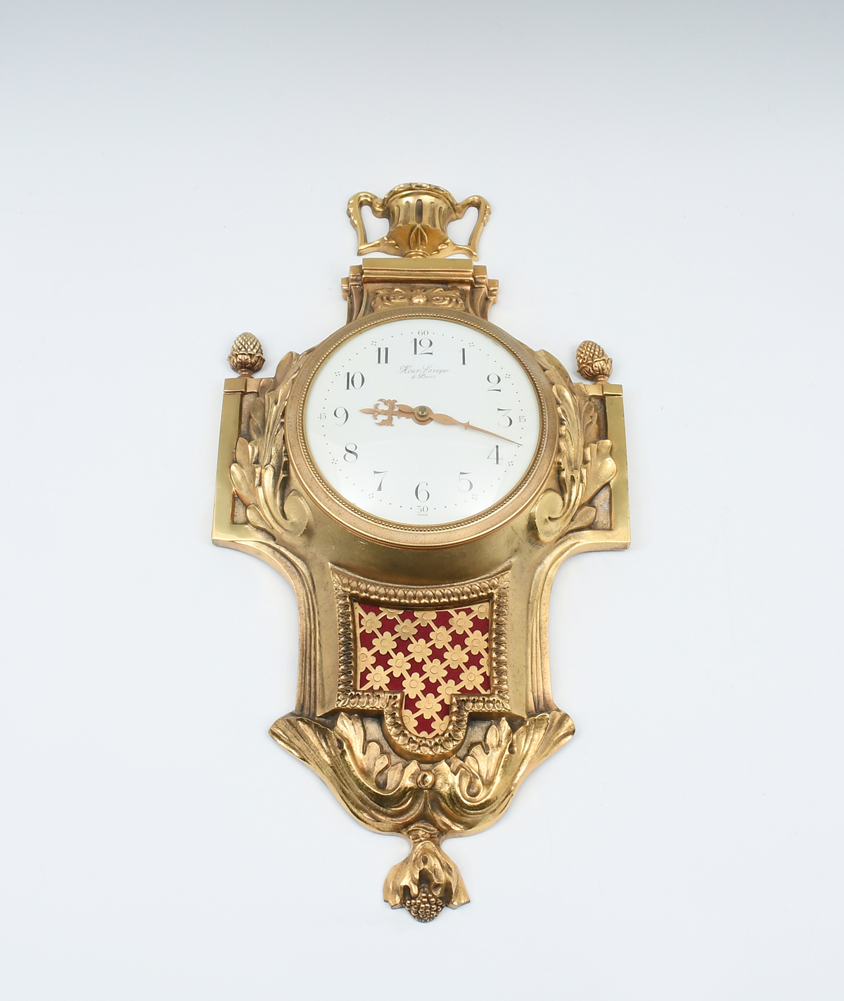 Appraisal: HOUR LAVIGNE GILT BRONZE CARTEL CLOCK Having an urn pine