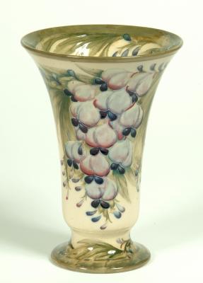 Appraisal: A MOORCROFT POTTERY VASE of trumpet form tube lined in