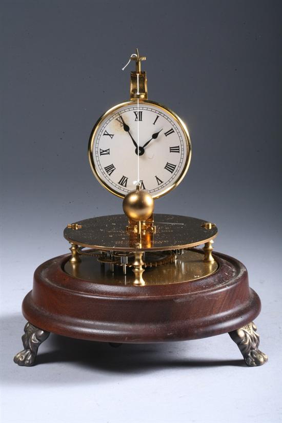 Appraisal: BRIGGS ROTARY PENDULUM CLOCK UNDER GLASS DOME A Charles Terioilliger