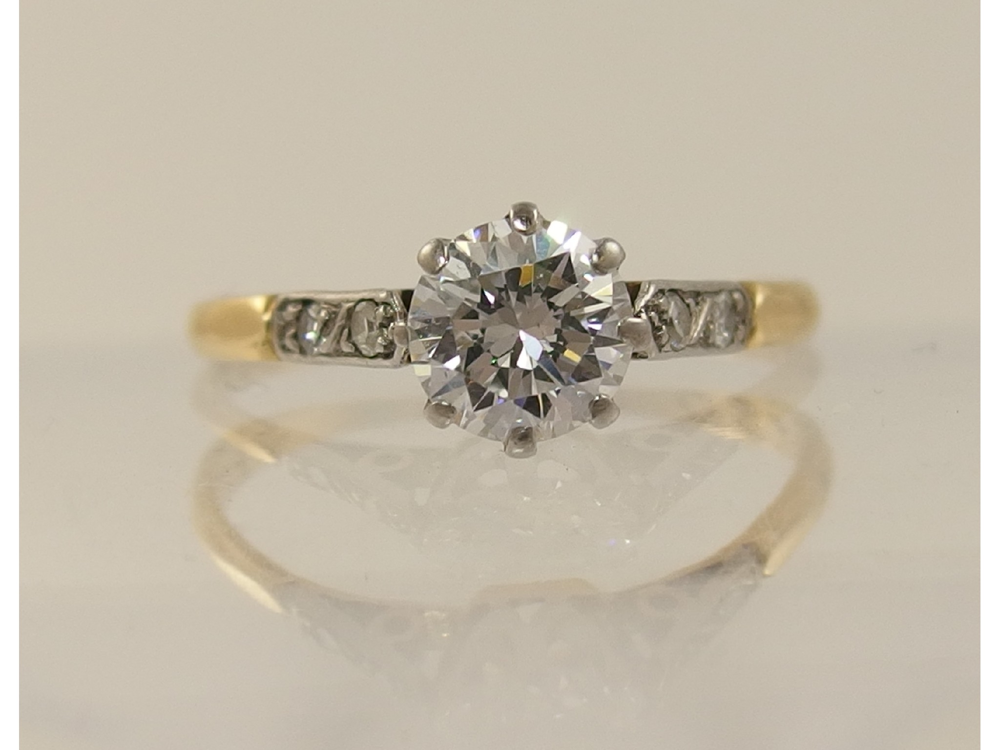 Appraisal: An ct solitaire diamond ring of approximately ctsthe main diamond