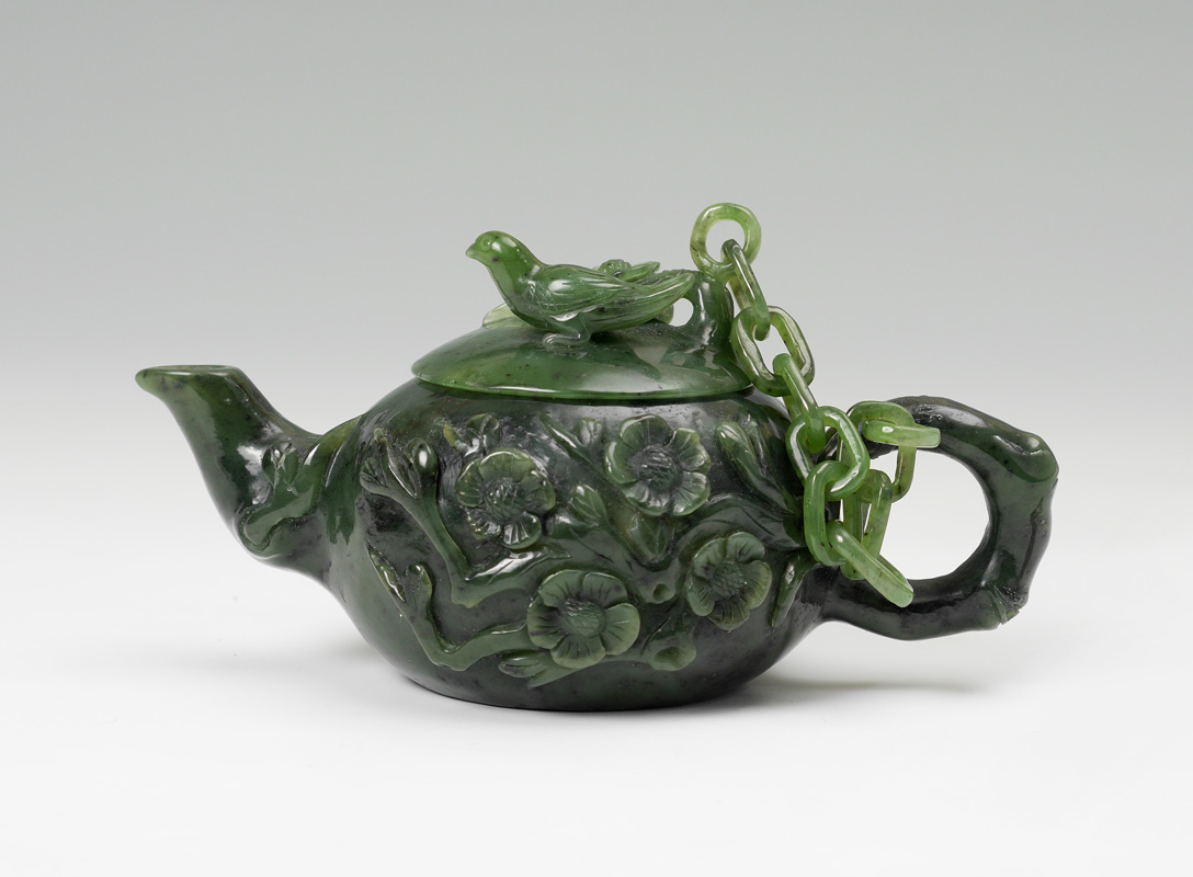 Appraisal: CHINESE CARVED SPINACH JADE TEAPOT Carved spinach jade or similar