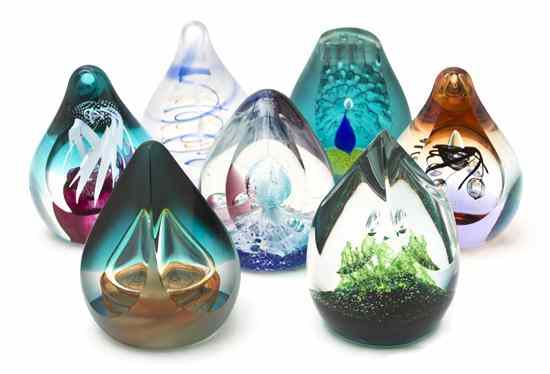 Appraisal: Seven Caithness Glass Paperweights of various tapering forms including Twister