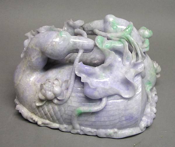 Appraisal: A large jadeite carving of two ducks th Century Seen