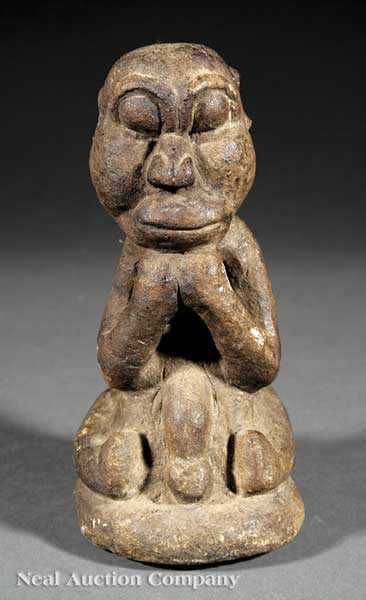 Appraisal: A Sierra Leone Carved Stone Nomoli or Pomdo Figure seated