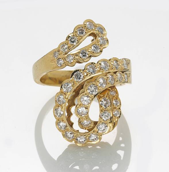 Appraisal: A diamond and k gold swirl design ring estimated total